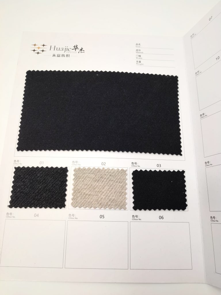 Fabric swatches on a sample sheet.