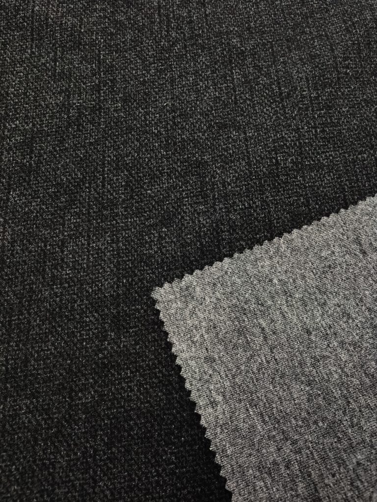 Black textured fabric close-up